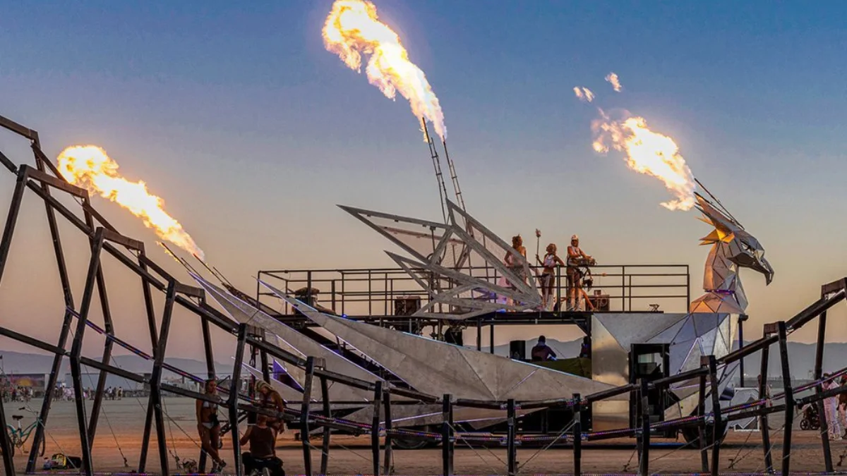 MetaPhoenix crossing the Black Rock Desert with three flame effects firing