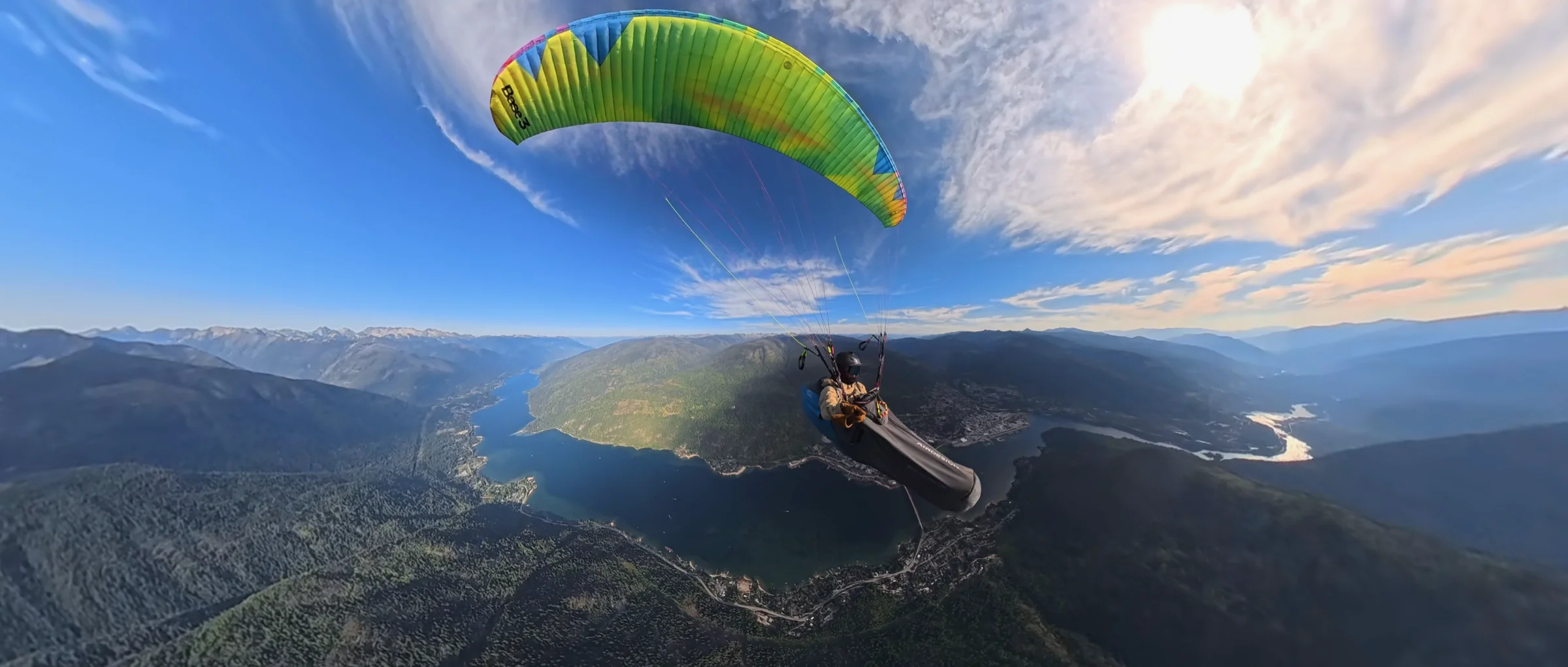 Justin flying the Base 3 over Nelson, the west arm of Kootenay Lake below